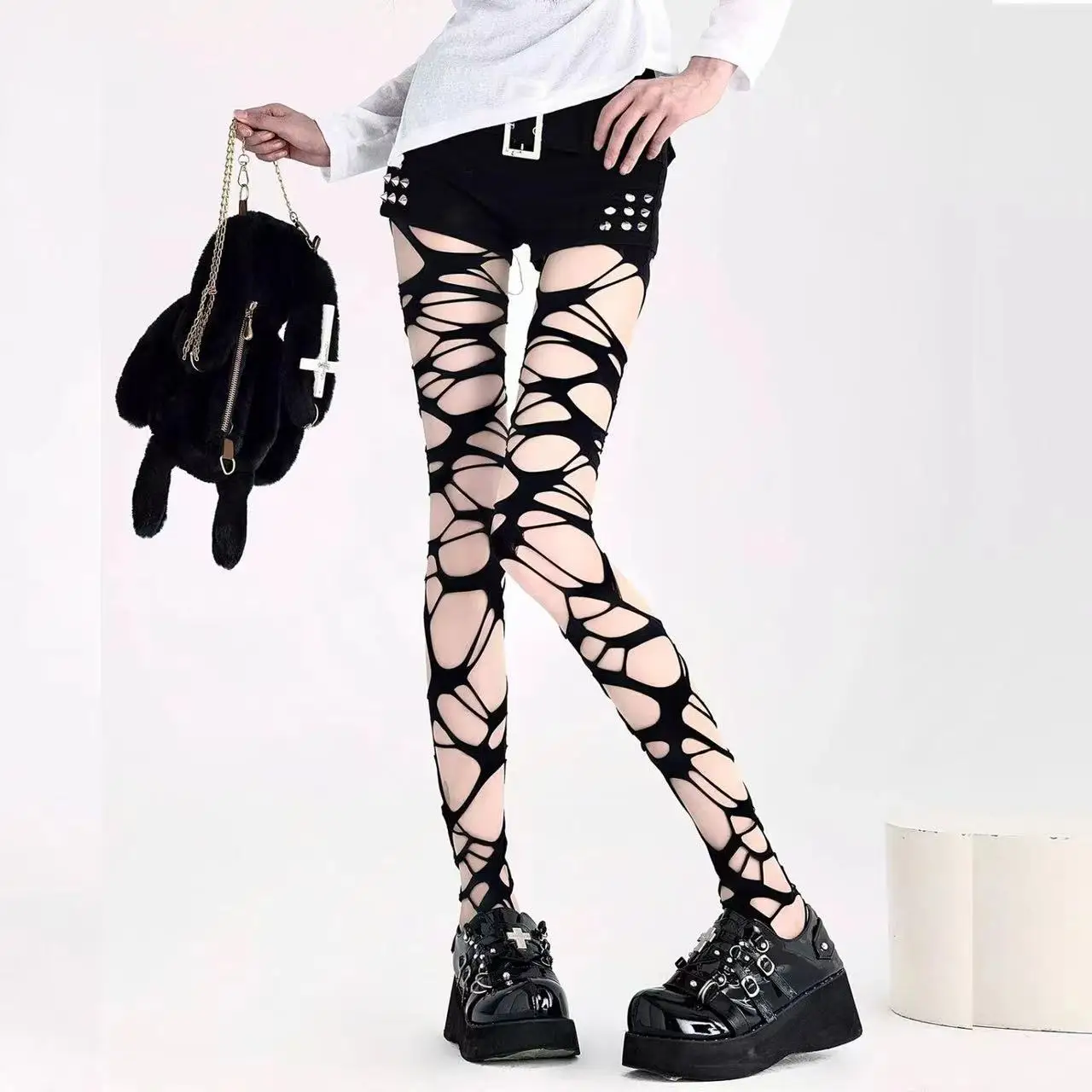 A pair of homemade gothic punk style stockings hot girl subculture Y2K black hole stockings bottoming pantyhose