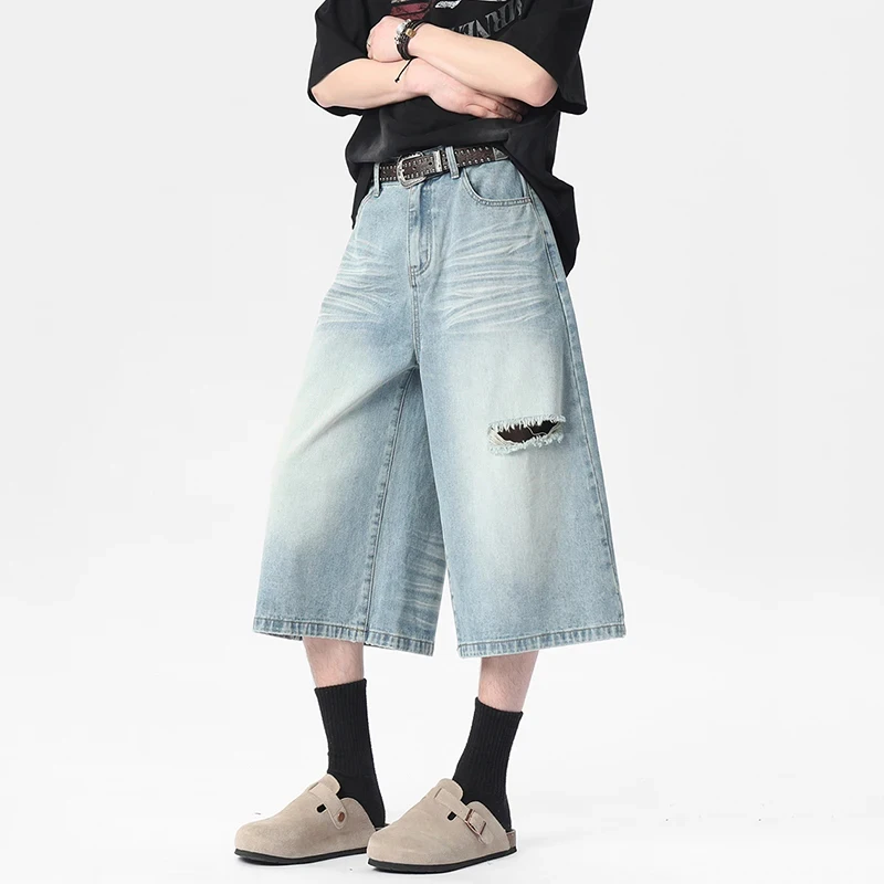 

Летние высококачественные черные мужские джинсовые шорты 2026 года, новые, с широкими штанинами, рваным дизайном и прямым кроем до колена