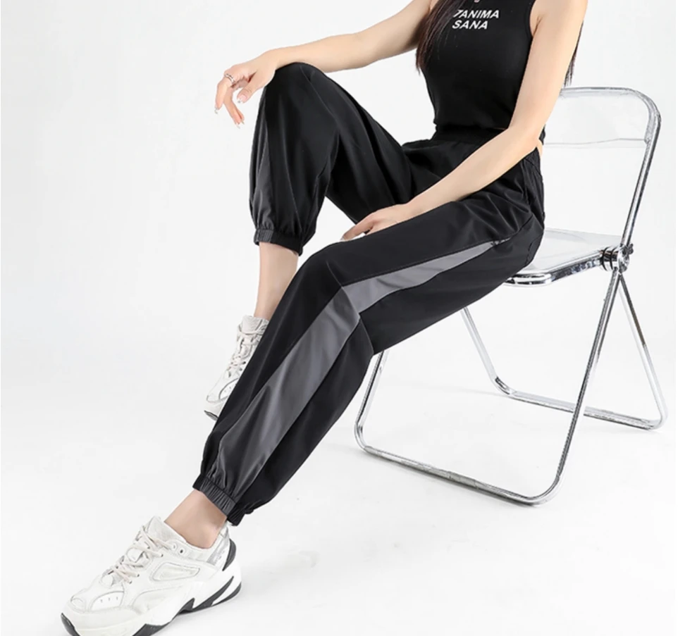 

Color contrast large size sports pants women's spring and autumn new 2024 high waist splicing loose running footguard pants