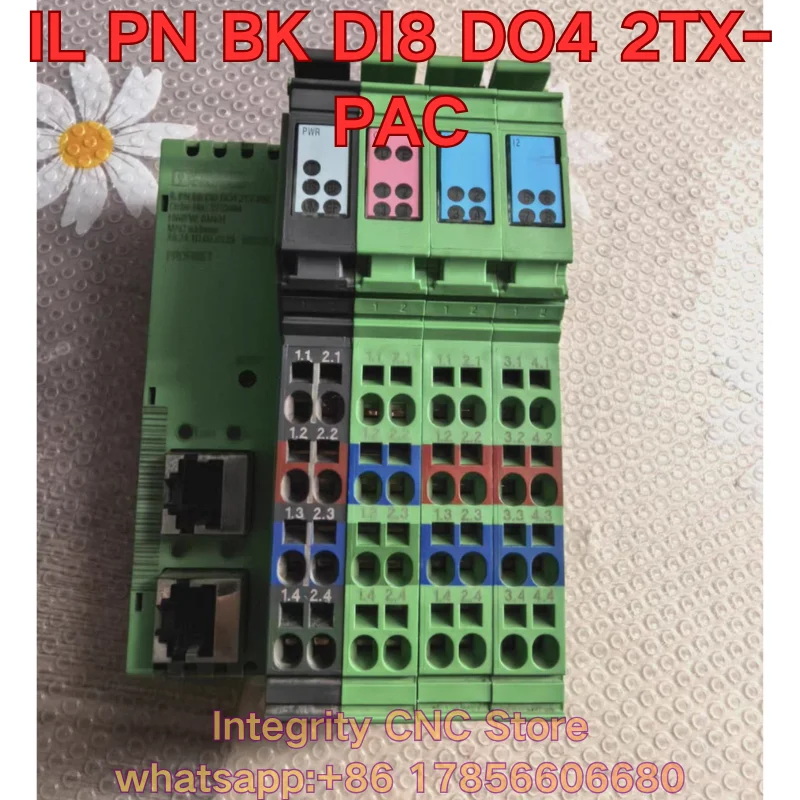 Second-hand IL PN BK DI8 DO4 2TX-PAC PLC module 2703994 functional test is normal