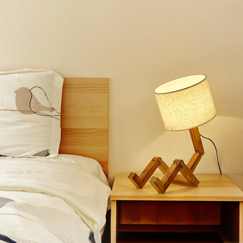 Solid wood humanoid lamp creative Nordic fashion style study bedroom bedside wood robot folding LED table lamp