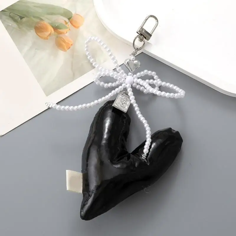 

Eye Catching Padded Keychain for Fashion Individuals Beaded Bowknot Bag Pendant 547A