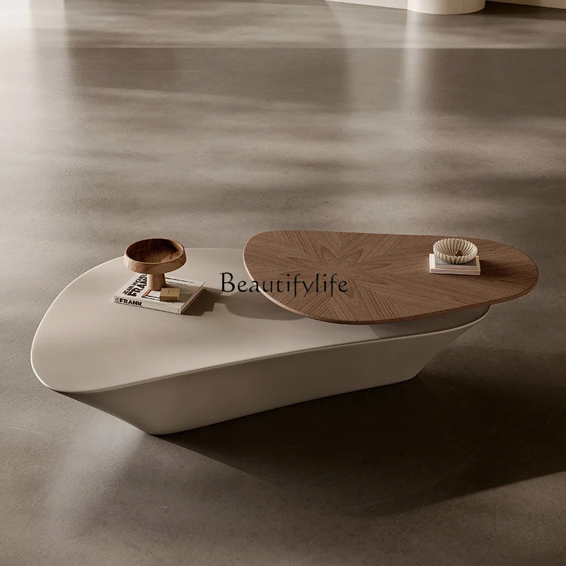 

*Italian special-shaped rotating coffee table living room modern minimalist wabi sabi designer villa creative tea table