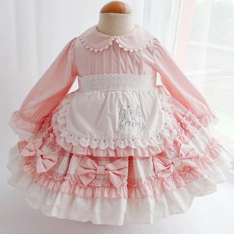 Rosa Peter-Pan-Kragen Langarm-Kinder-Lolita-Kleid mit Spitzenschürze, Stickerei, Rüschenrock und großer Schleife, Süßes Prinzessinnen-Outfit für Kinder – Detail 1