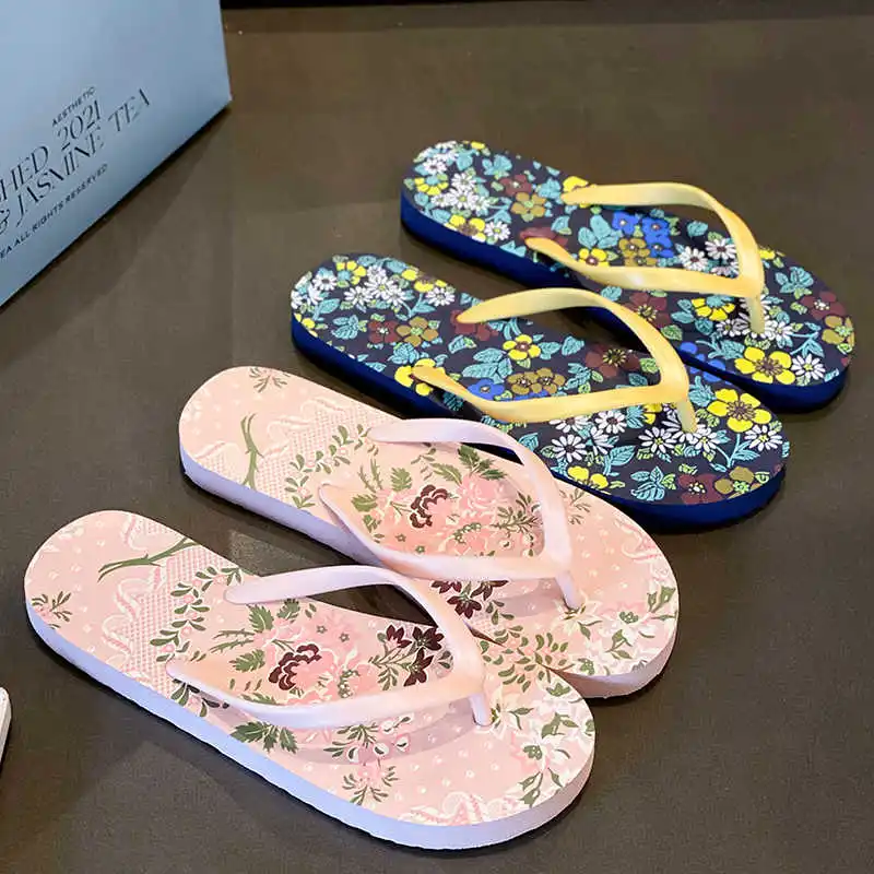 Chanclas de playa de verano para mujer, zapatillas de fondo plano con estampado de flores dulces, férula antideslizante a la moda, zapatilla de viaje de EVA