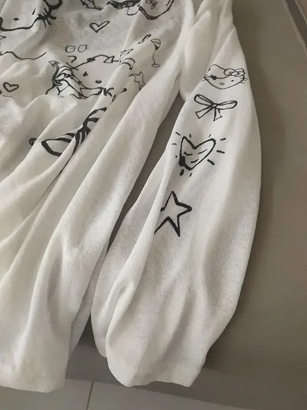 Hello Kitty-Camiseta de manga larga con cuello redondo y protección UV para mujer, Top informal holgado Kawaii de gran tamaño, 2025