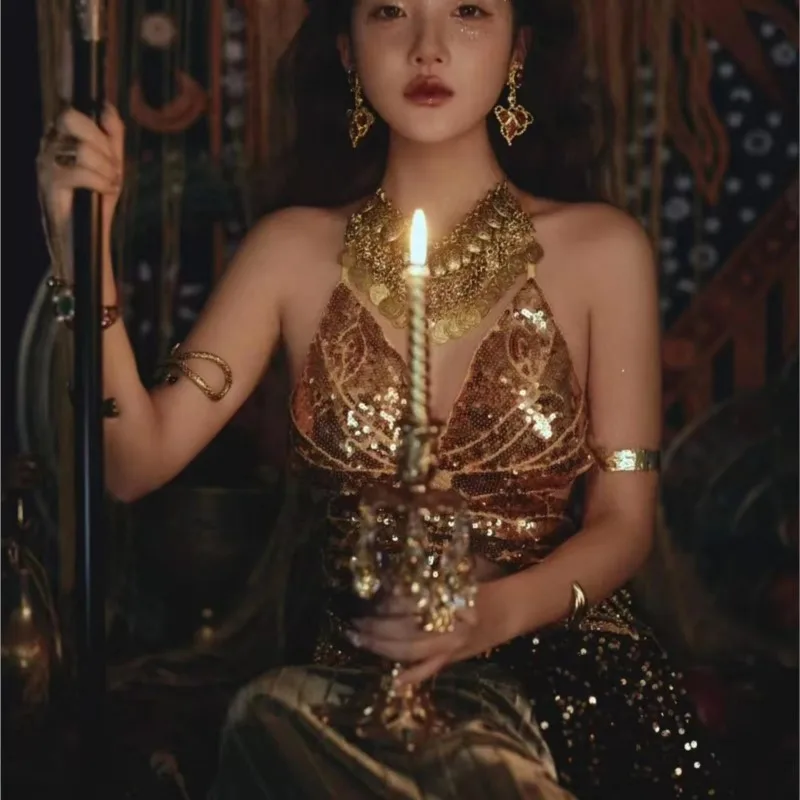 A new style of exotic travel photography with golden top starry chiffon pleated skirt