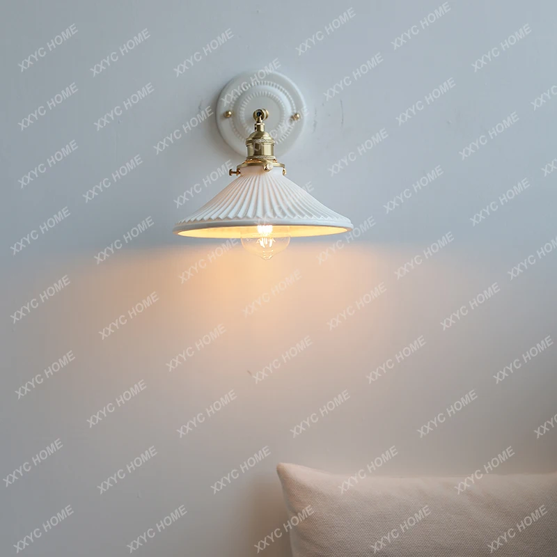 

Cream wind wall lamp Bedroom bedside creative homestay corridor background wall glazed pleated ceramic wall lamp