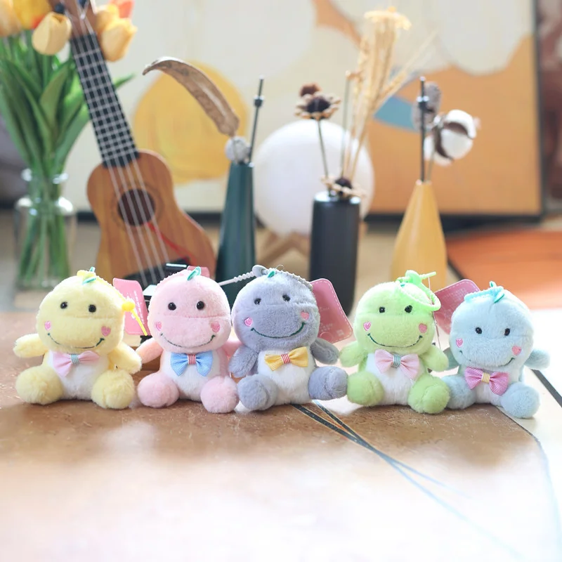 Peluche de dinosaure en forme d'animal de dessin animé, jouet de beurre, pendentif, sac à dos, tentures, ornements, cadeaux
