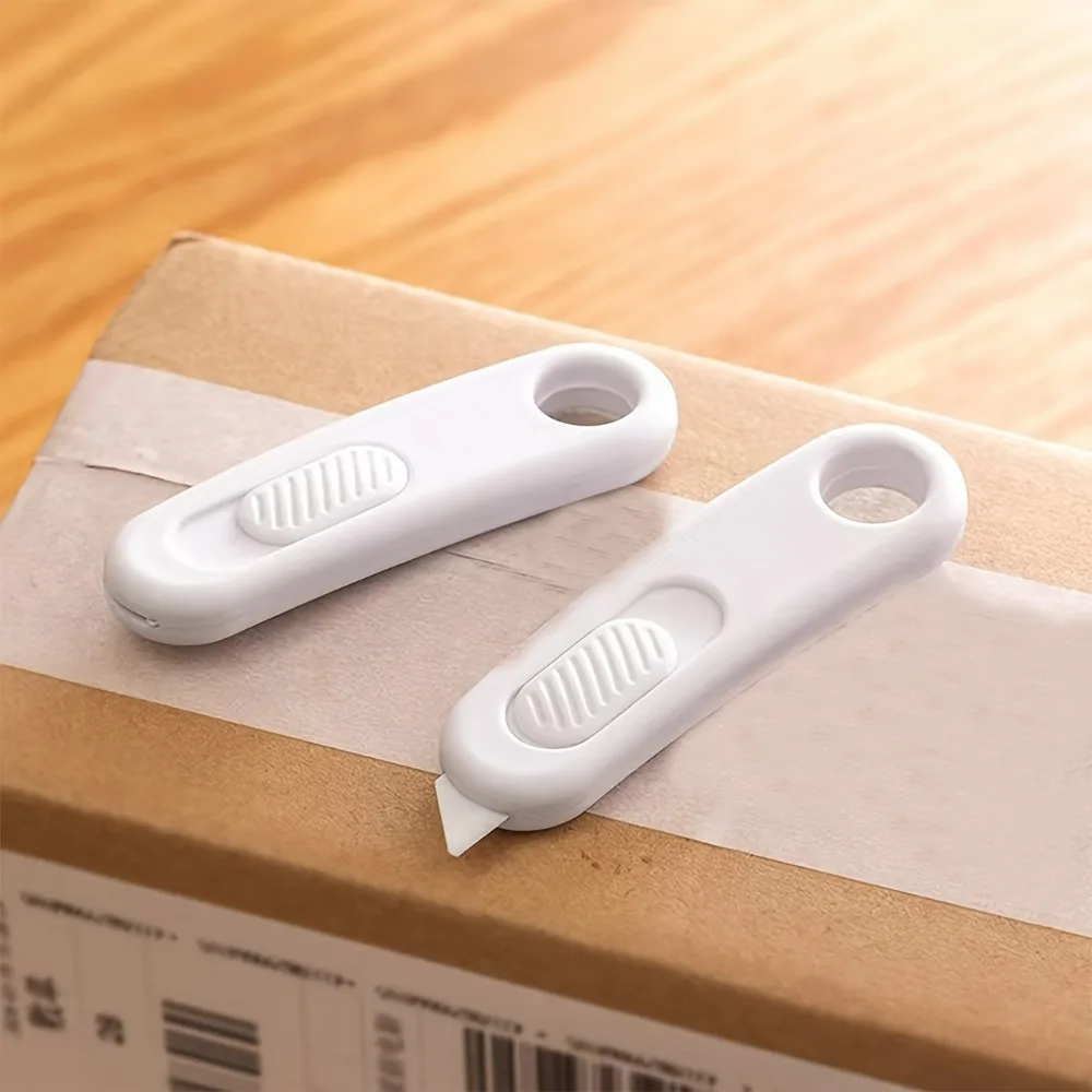 المحمولة البسيطة السيراميك سكّين متعدّد الاستخدامات شفرات آمنة صندوق التعبئة والتغليف فتاحة أدوات القطع مع المفاتيح شنق ثقب مع شفط المغناطيسي