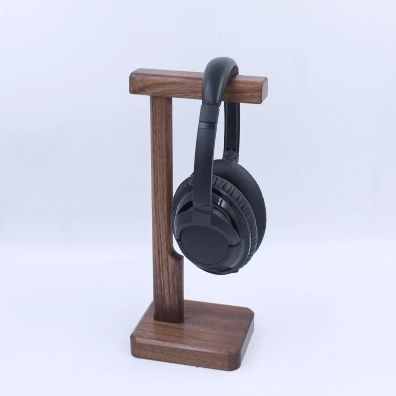 แผ่นไม้วอลนัทสีดำขาตั้งหูฟังอเนกประสงค์สำหรับนักเล่นเกมหูฟังเกมเครื่องประดับฐานแบบหนา
