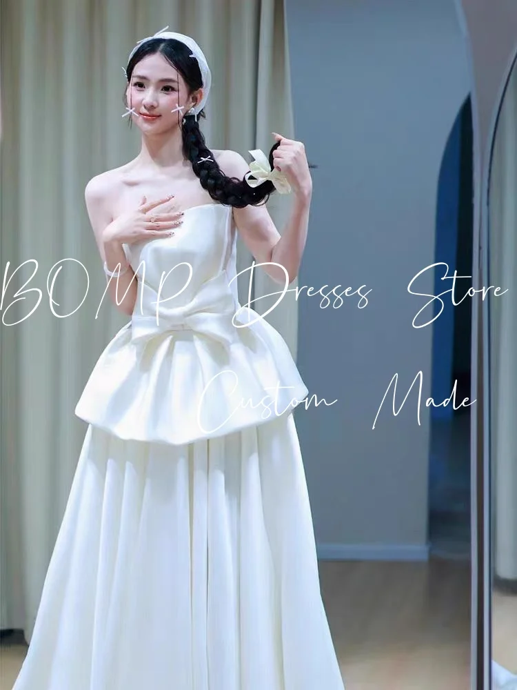 فستان BOMP بسيط لحفلات الزفاف بدون حمالات على شكل حرف a طول الأرض من الساتان الأبيض كوريا لالتقاط الصور فستان استقبال الزفاف مخصص