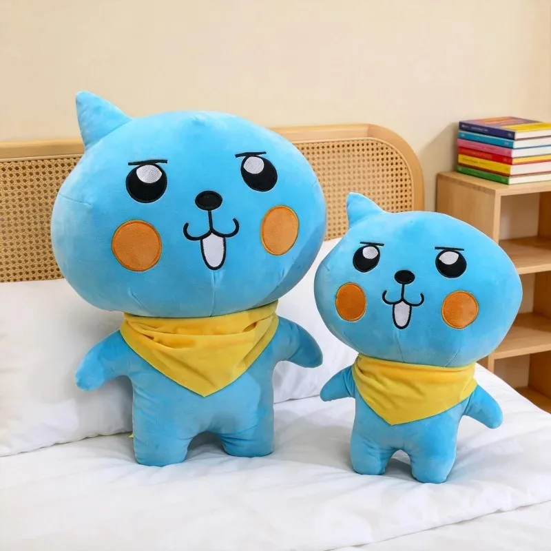 

Soft Huggable Qoo Plushie Blue Cartoon Character Stuffed Toy with Cheeky Face & Yellow Scarf Great for Fans & Kids Bedroom Decor