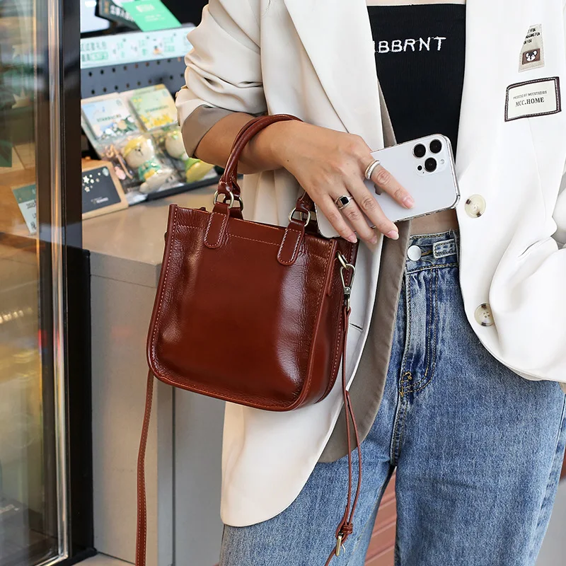 

2024 New Niche Design High-end Genuine Leather Tote Bag Women's Cowhide Sugar Cube Bag Fashion Handheld Crossbody Bag