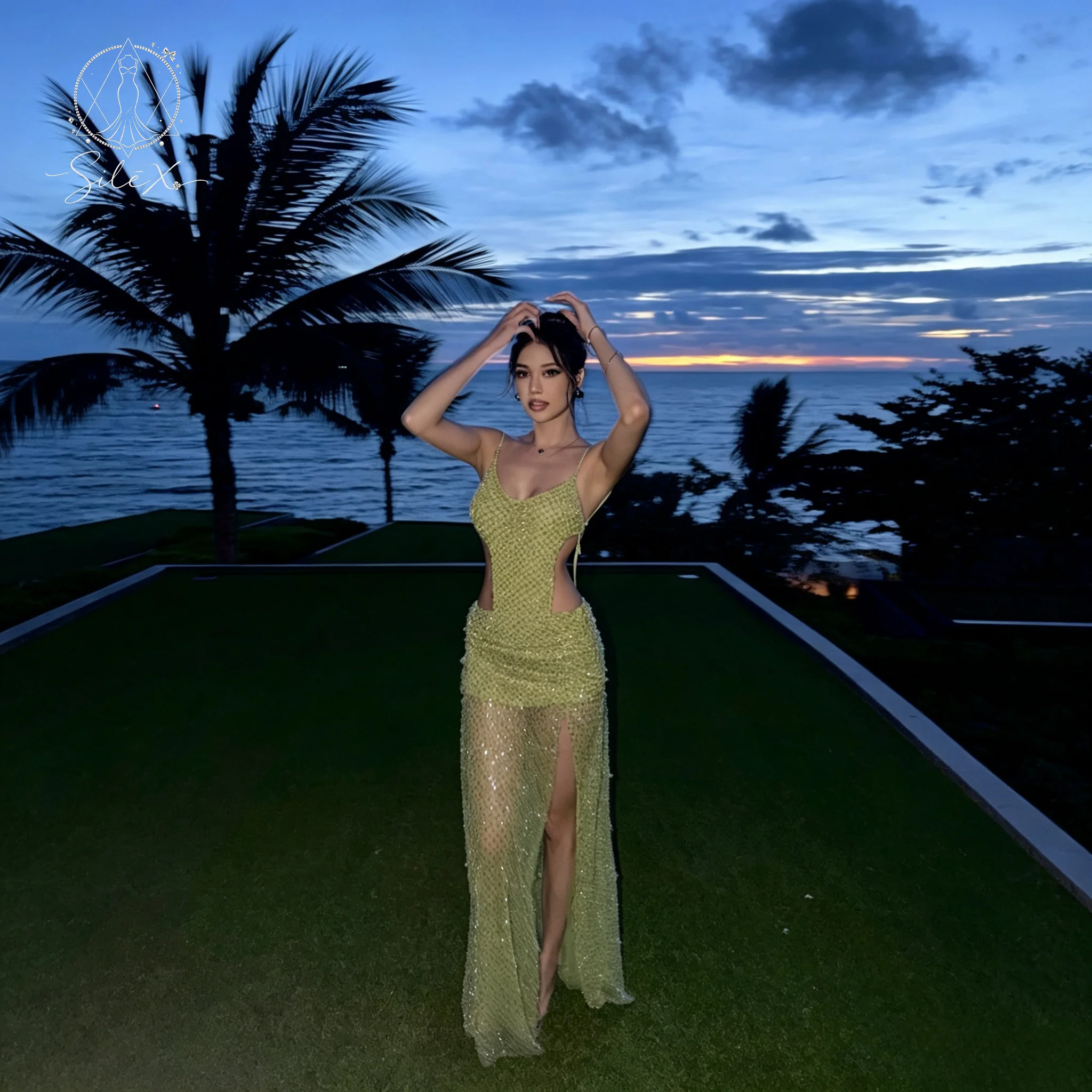 Green strapless halter dress for formal occasions ball gown sequined revealing the waist sheer see-through effect