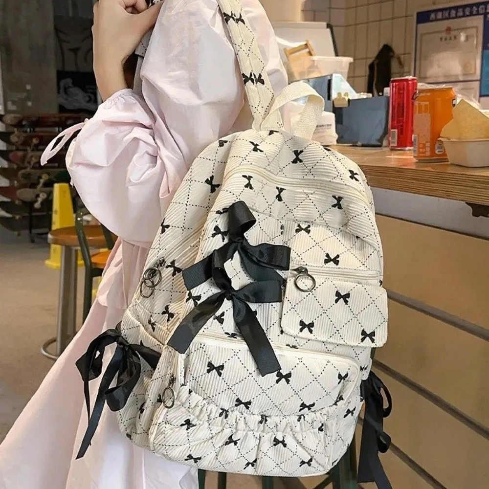 أزياء سروال قصير القوس المدرسية سعة كبيرة القوس طباعة تنوعا على ظهره Ins نمط حقيبة الظهر حقيبة المرأة