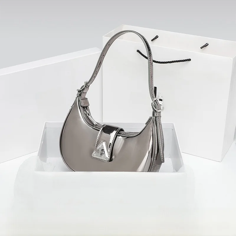 

Серебряная кожаная сумка-полумесяц для женщин, городская сумка через плечо, люксовая модель от бренда Charine&Kath