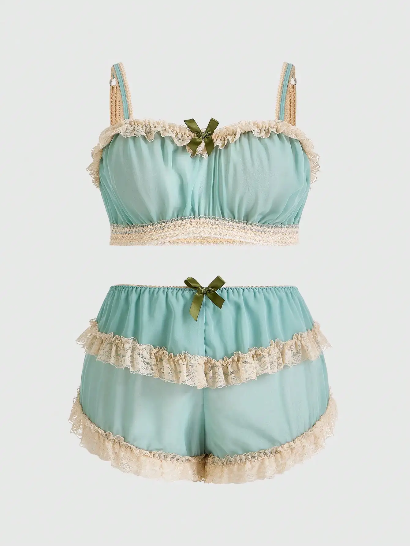 Conjunto de bralette y pantalones cortos con volantes y ribete de encaje verde menta con detalle de lazo