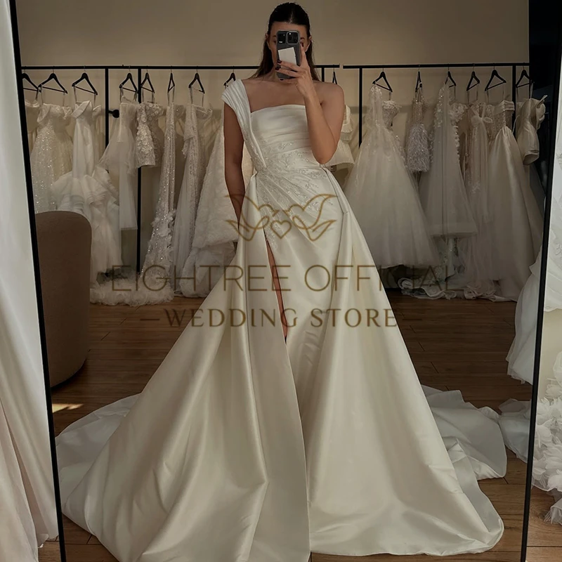 Eightree Boho 2025, Meerjungfrau-Hochzeitskleider, eine Schulter, seitlicher Schlitz, Perlen, Brautkleid, weiße Hochzeitsball-Abschlussballkleider, individuell gestaltet