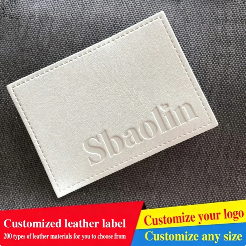 Custom leather labels from manufacturers, waist tags, genuine leather accessories with embossed/debossed logos, leather patch de