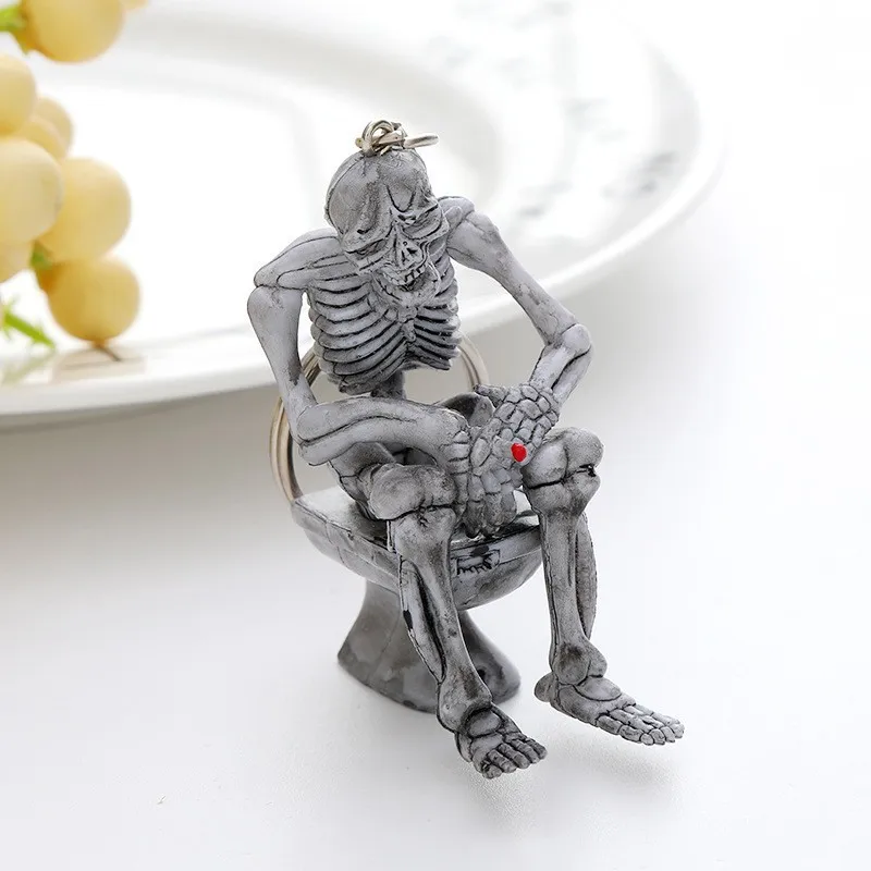 Skull Toilet Keychain, Skeleton Sitting on Toilet Keyring, Funny Halloween Spoof Gift, Punk Novelty Key Holder for Men Women