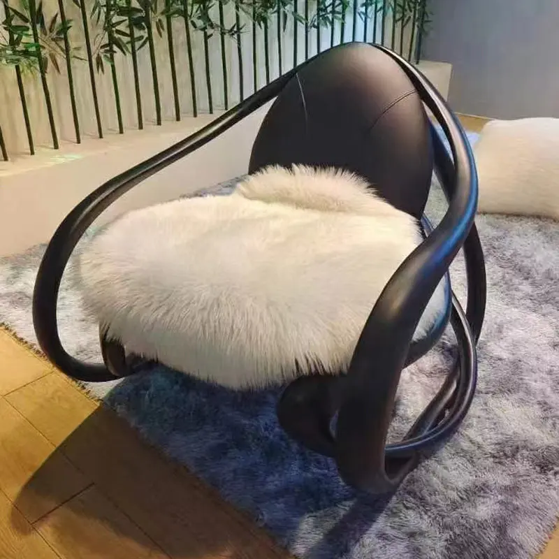 

Italian minimalist rocking chair designer artistic creativity special-shaped leather rocking chair