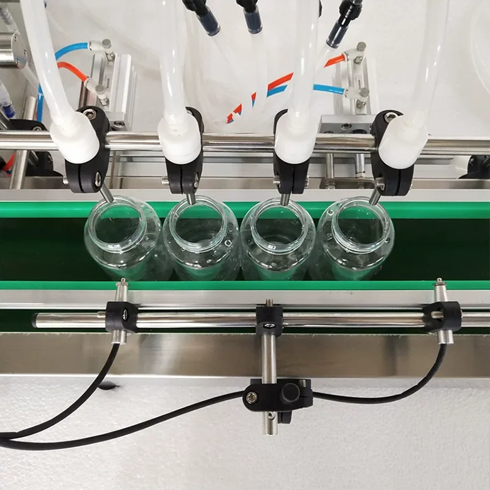 Desktop Small Single Multi Head Liquid Filling Machine 2 3 4 6 8 Heads Milk Juice Pure Water Filling Production Line for  Bottle