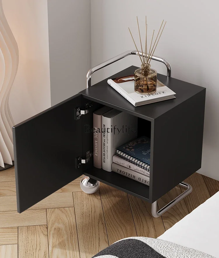 

Cream wind bedside table minimalist stainless steel storage medieval black solid wood paint