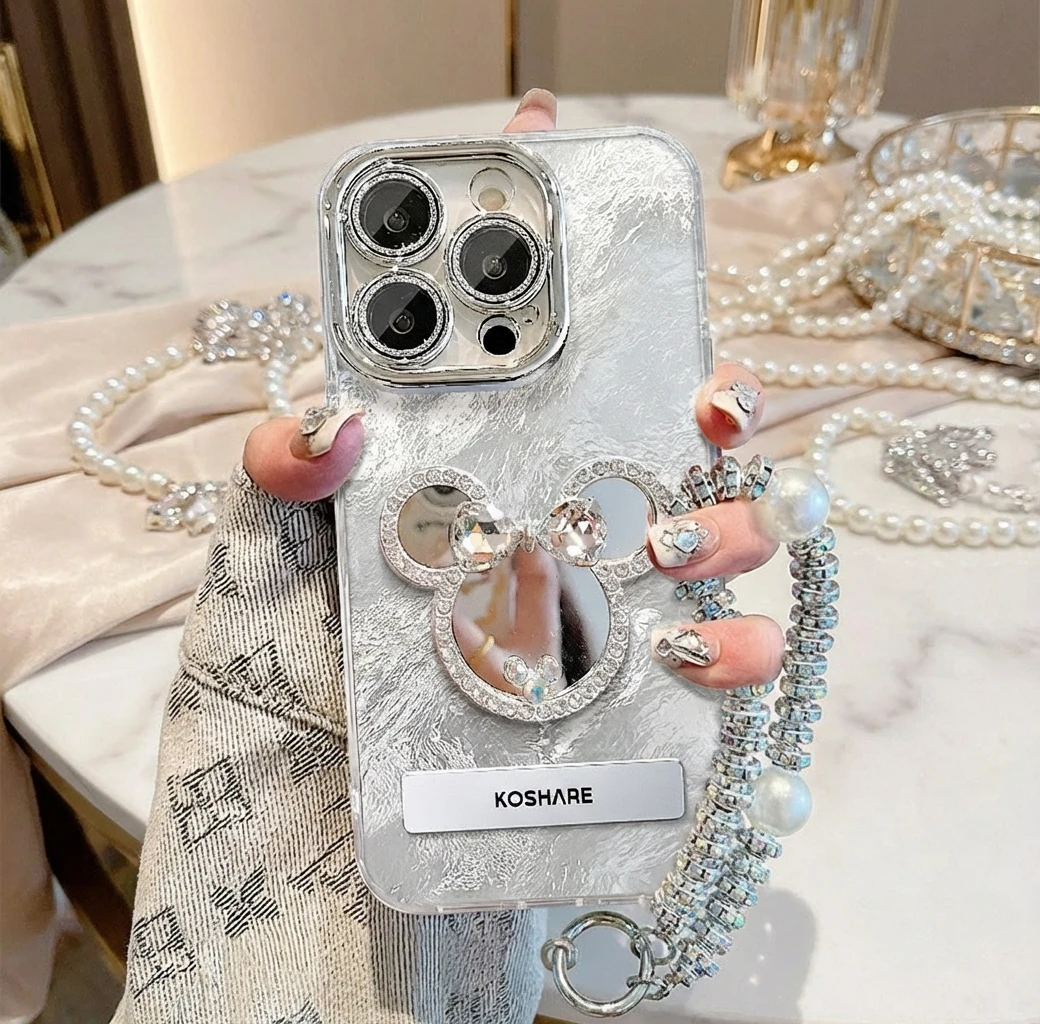 

Чехол для iPhone 17 с зеркальной подставкой и цепочкой в стиле Микки, совместимый с iPhone 16, 15, 14, 13. Хит продаж. Премиум-качество. Текстура фольги. Защита объектива.