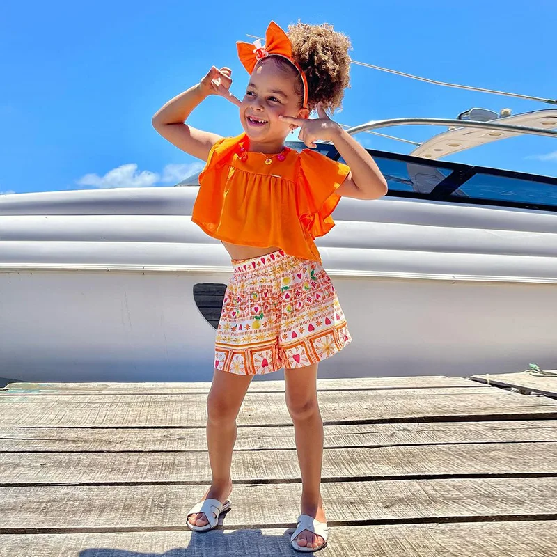 Set di vestiti estivi per neonate per bambini Casual Solid Ruffles t-shirt a maniche corte Crop Top + pantaloncini con stampa a cuore abbigliamento per bambini