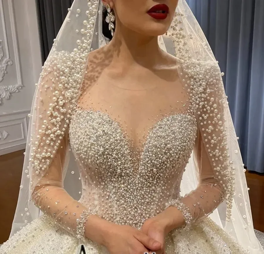 Customized Arabic Dubai Women Wedding Dress Illusion Neck Long Sleeves Stunning Beading Pearls Sequine Bride Gowns Robe Mariage