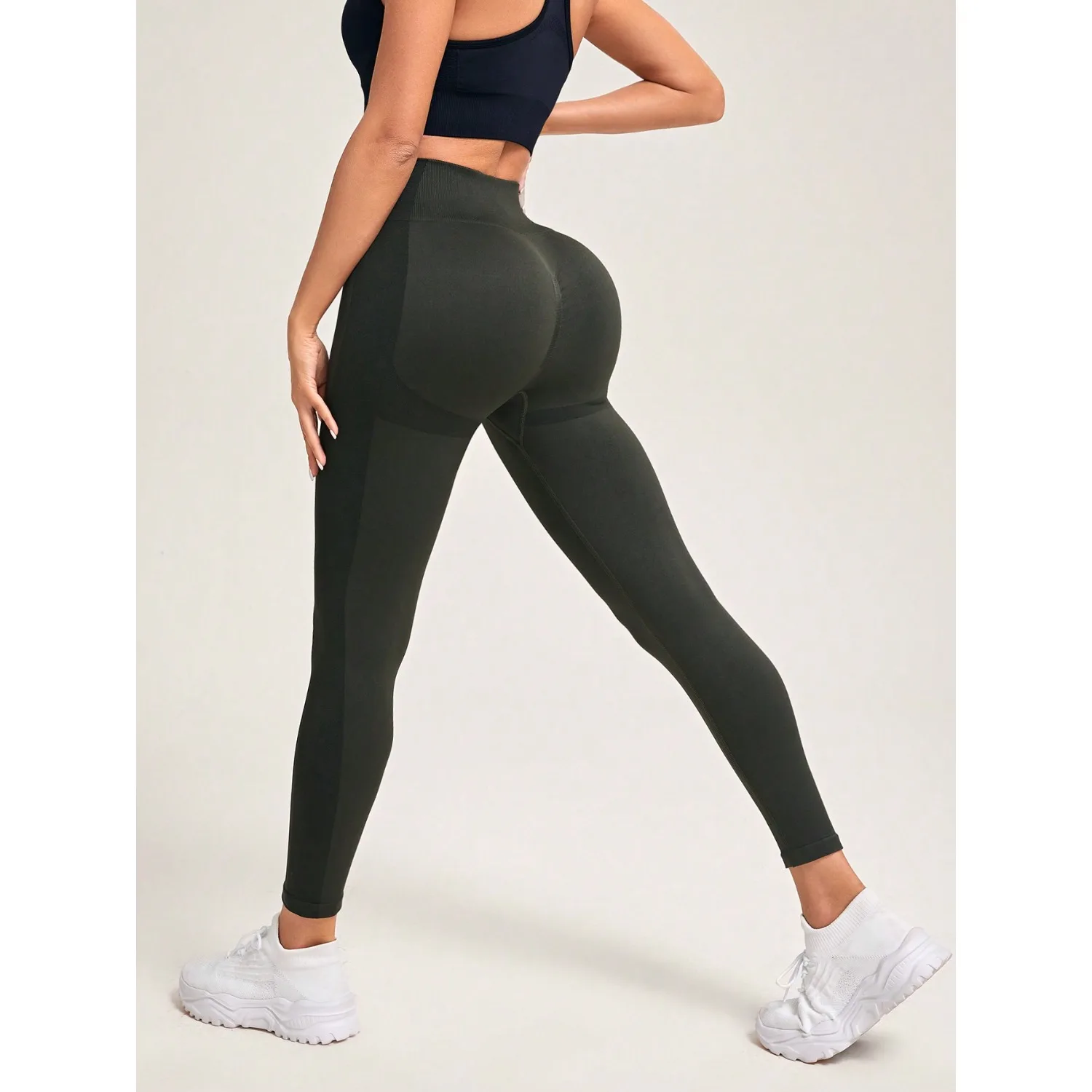 Nuovi pantaloni sportivi in tinta unita da donna senza cuciture Vita alta sexy Pantaloni da yoga in maglia attillata all'anca color pesca Leggings da yoga per esercizi da palestra