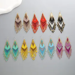 Rice bead earrings  Hand woven  fashion  Swallowtail  Simplicity  personality  Beading  Bohemia  alloy  ma'am  Fringed earrings