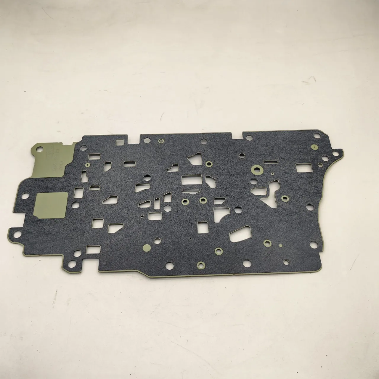 Integrated transmission component JM5P-7J236-D: 8F35 control valve partition plate (between valve body and housing)