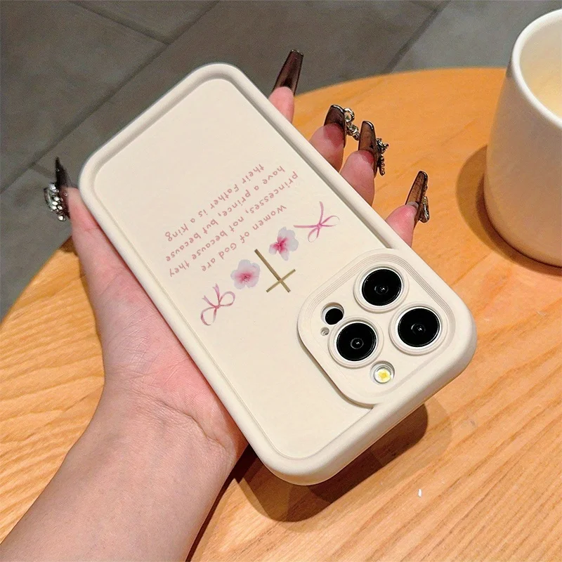 Proste etui na telefon z motywem religijnym: krzyż, kwiat, kokarda i slogan, pasujące do iPhone'a 16, 15, 14, 13, 12 Pro Max.