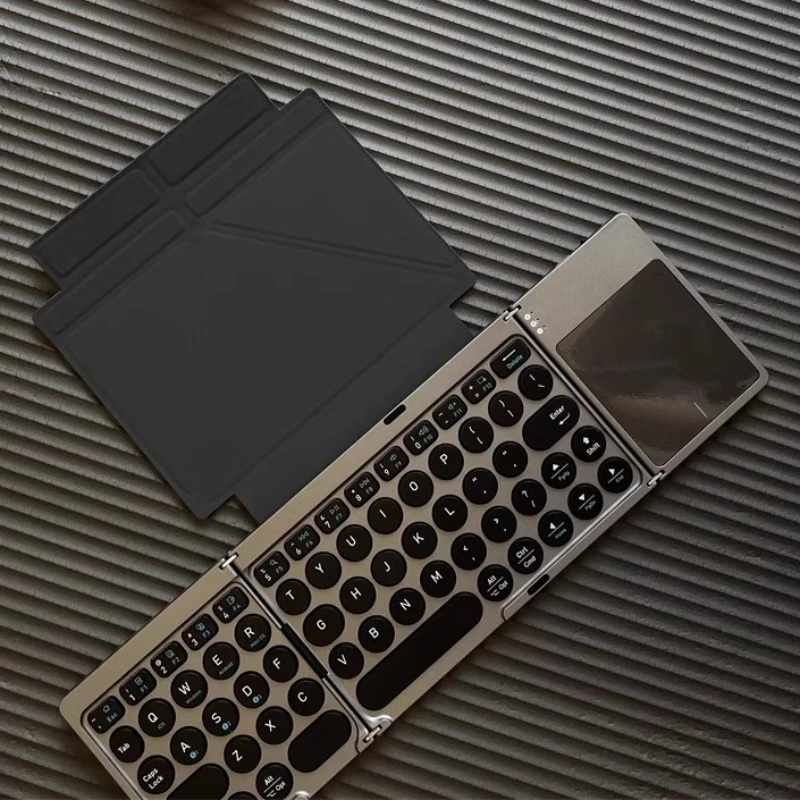 Mini teclado Bluetooth triple plegable, teclado magnético para IPad, almohadilla táctil inalámbrica, soporte para ordenador portátil, portátil de oficina