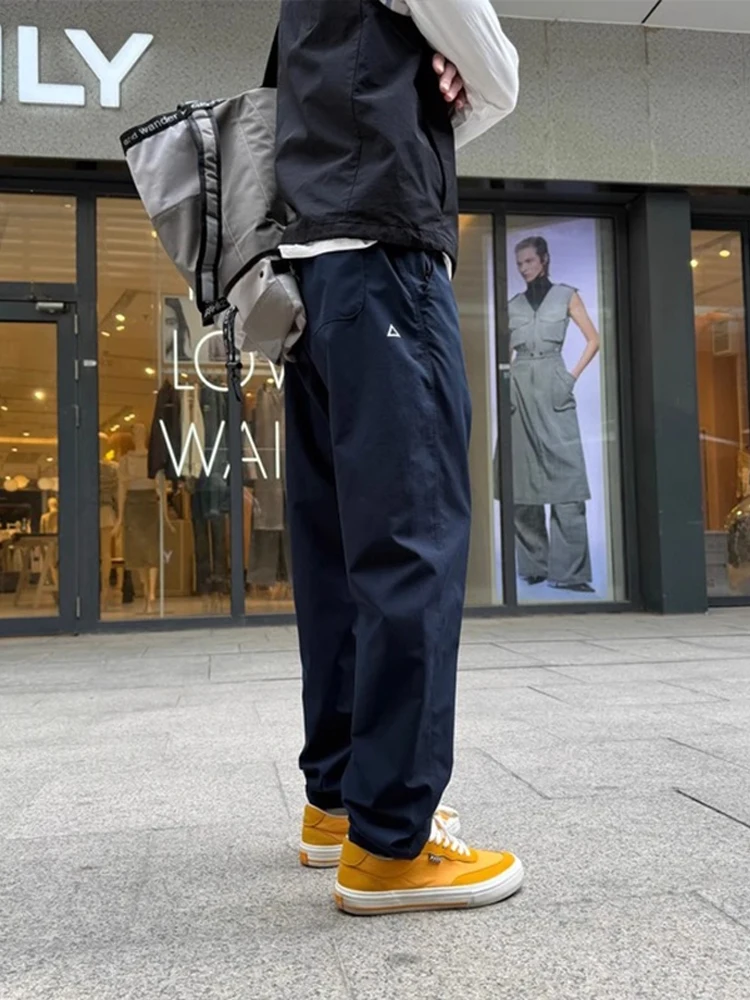 Olive een Pantaloni a cono con etichetta triangolare Pantaloni da lavoro da arrampicata all'aperto Sle da uomo Pantaloni casual traspiranti stagione autunnale