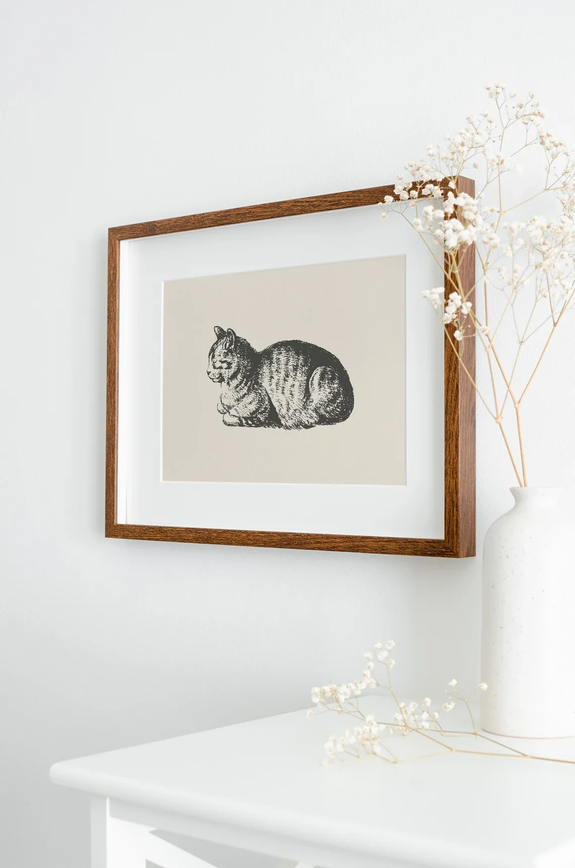 Serene Sleeping Cat Vintage Wall Art - Timeless Print Celebrating Feline Rest. The Soft Beige Backdrop and Detailed Linework Cre
