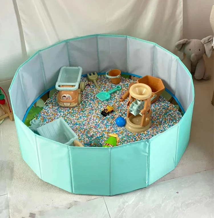 Children play with sand set sand pool family toys.