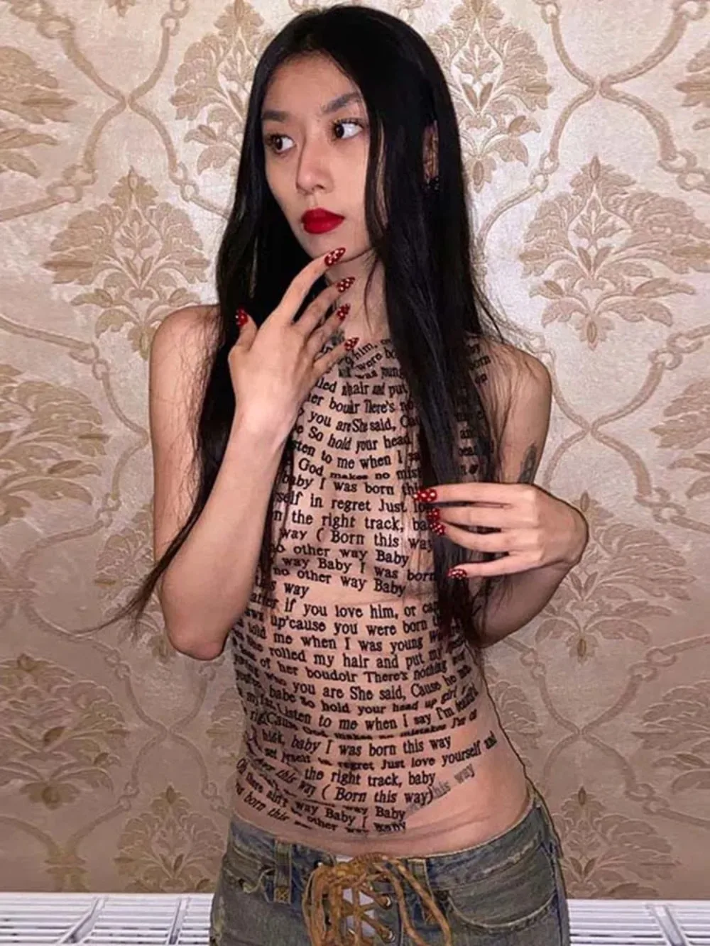 Moda trendy colletto tondo senza maniche canotta in rete articolo sexy stampa slim casual top donna pantaloni a vita bassa