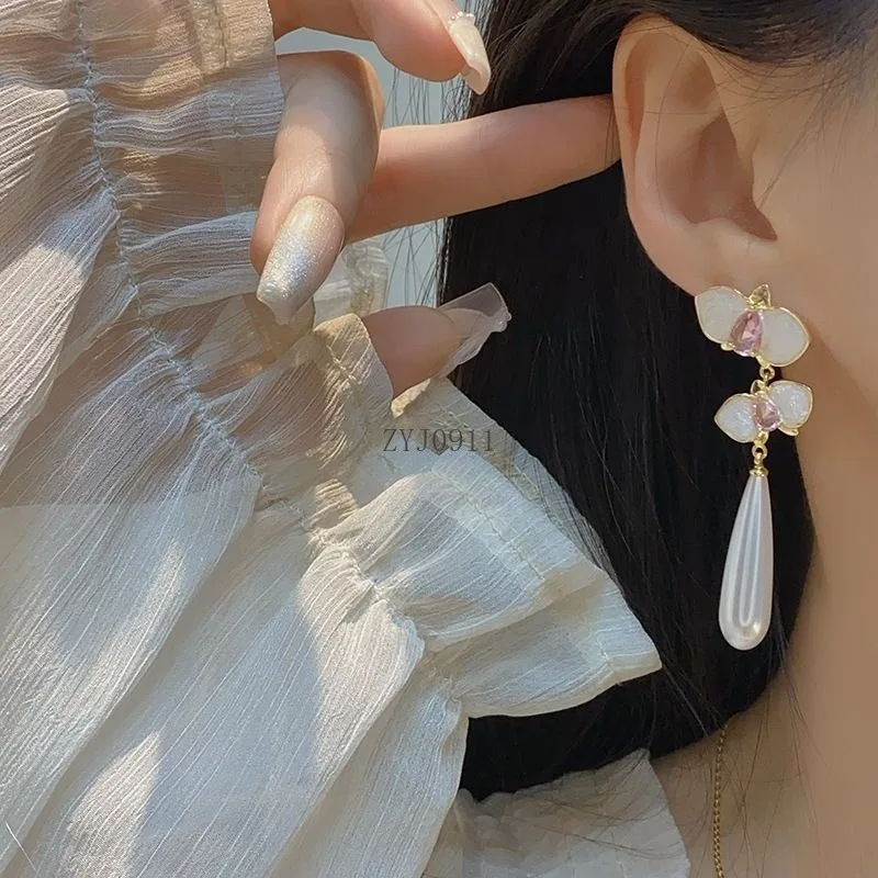 Retro nieuwe Chinese high-end gevoel unieke emaille druppelglazuur roze lange franjes pareloorbellen oorclip oorbellen