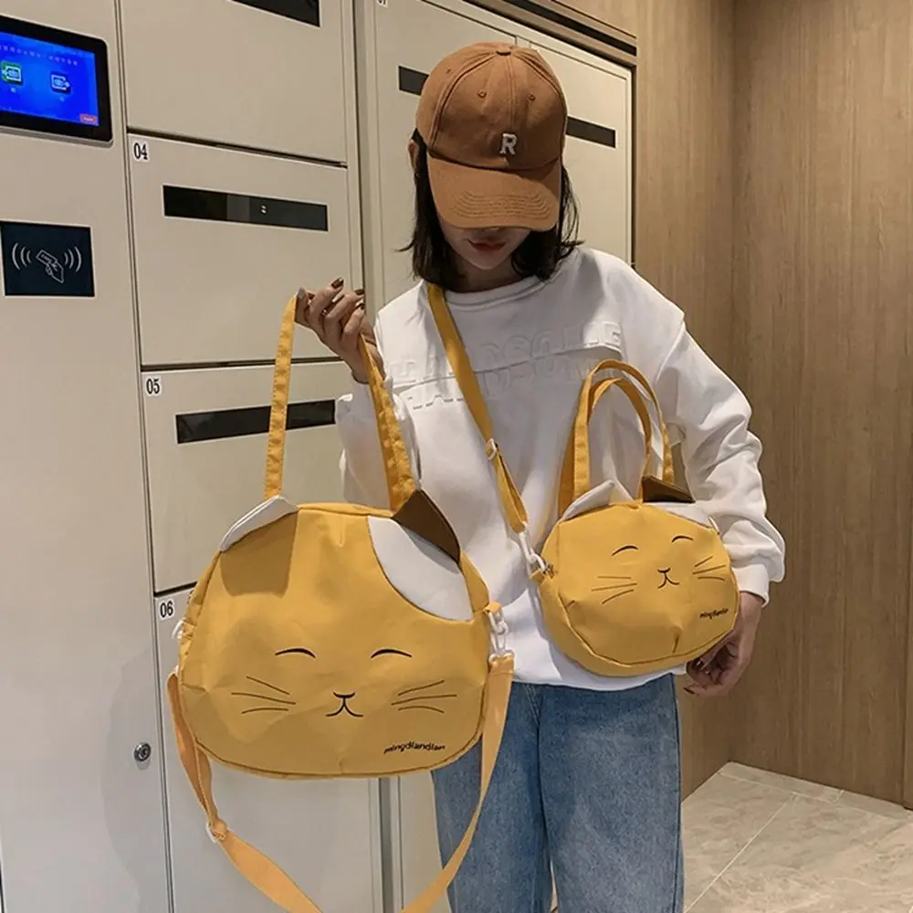 Casual canvas nylon prints kat messenger bag grote capaciteit college stijl handtas schoudertas draagbare crossbody tas meisje