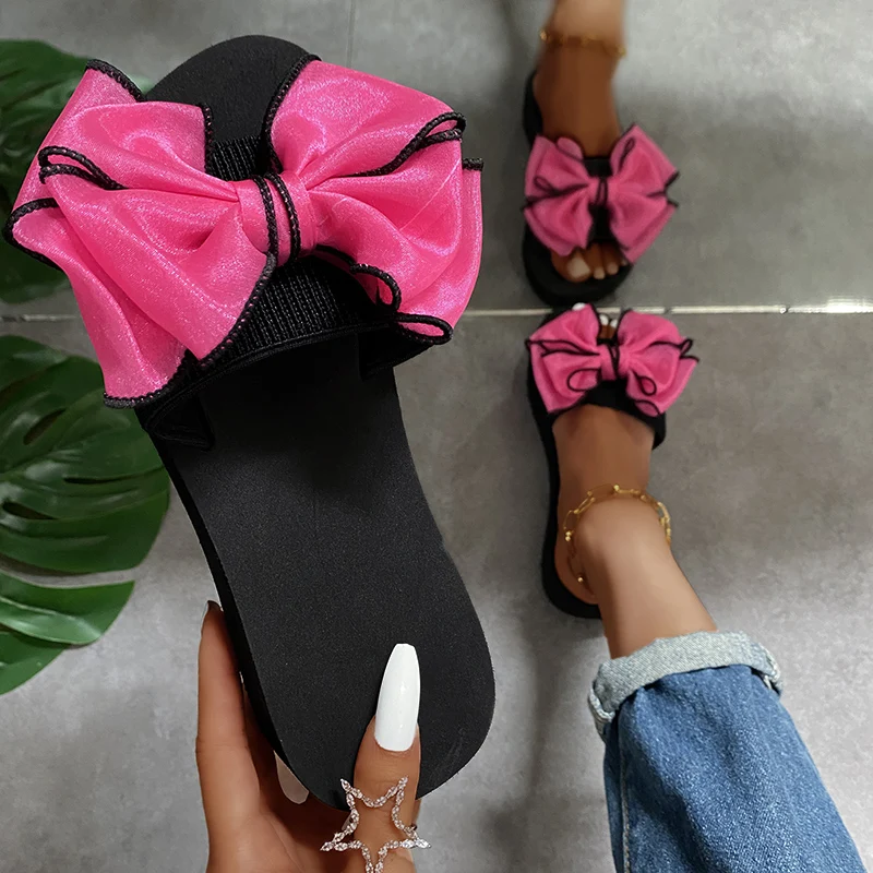 

Летние женские тапочки с декором в виде банта, легкая пляжная обувь без шнуровки для женщин, нескользящие сандалии на плоской подошве для отпуска, домашние шлепанцы, женские шлепанцы
