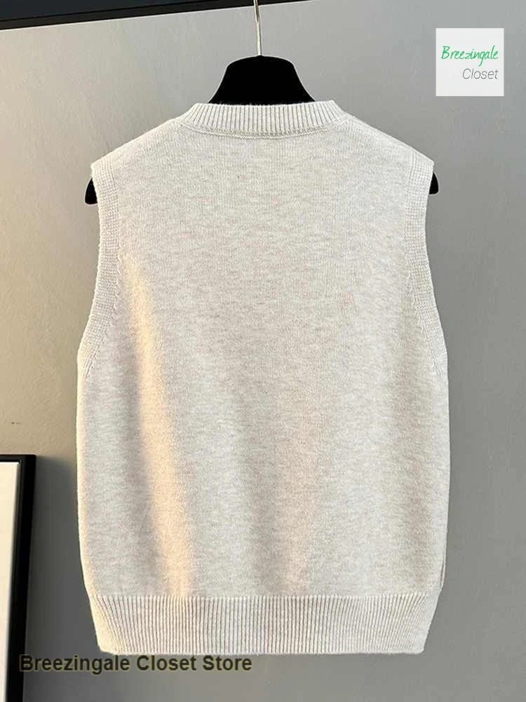 سترة كورية محبوكة بلون سادة ورقبة على شكل حرف V سترة نسائية للربيع والخريف سترة جوكر غير رسمية فضفاضة جديدة على الموضة.