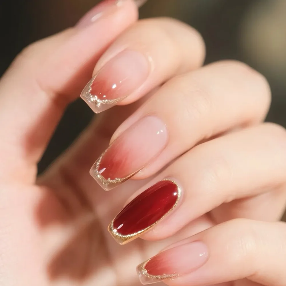 

24pcs Wine Red Press-On Nails in Solid & Gradient Finish with Gold Glitter Border, Long Coffin Shape, Assorted Sizes