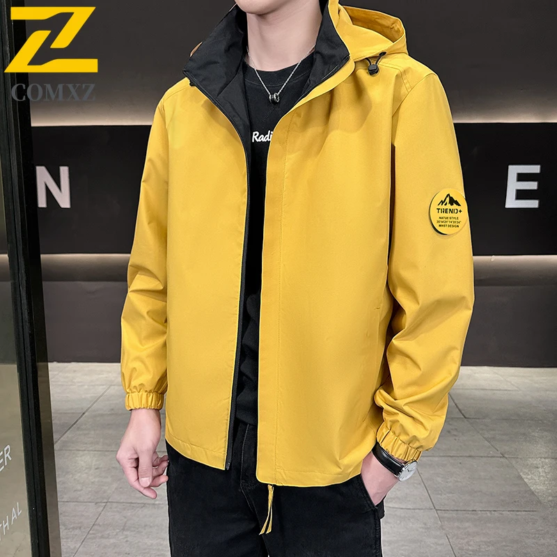 

COMXZ 2026 Casual Windproof Jacket Men Spring Autumn New Trendy Printed Waterproof Hooded Coat Hiking Solid Color Windproof Coat
