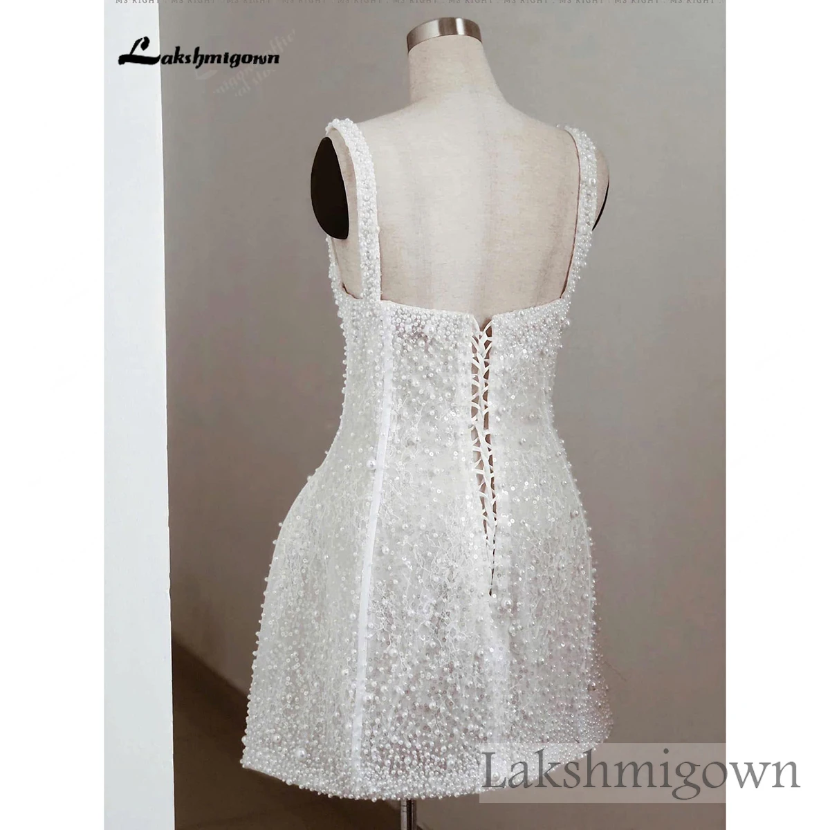 Lakshmigown Perlenverziertes Mini-Hochzeitskleid mit Transparentem Korsett-Mieder und Schnürung am Rücken für Empfang und Elopement. – Detail 8