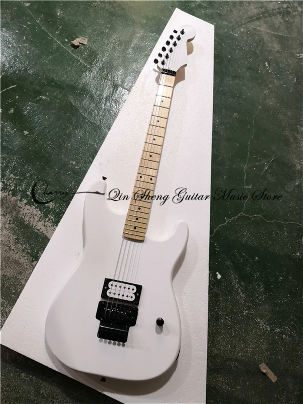 Char white guitar, 6-string electric guitar, black tremolo bridge, white pickups, white head