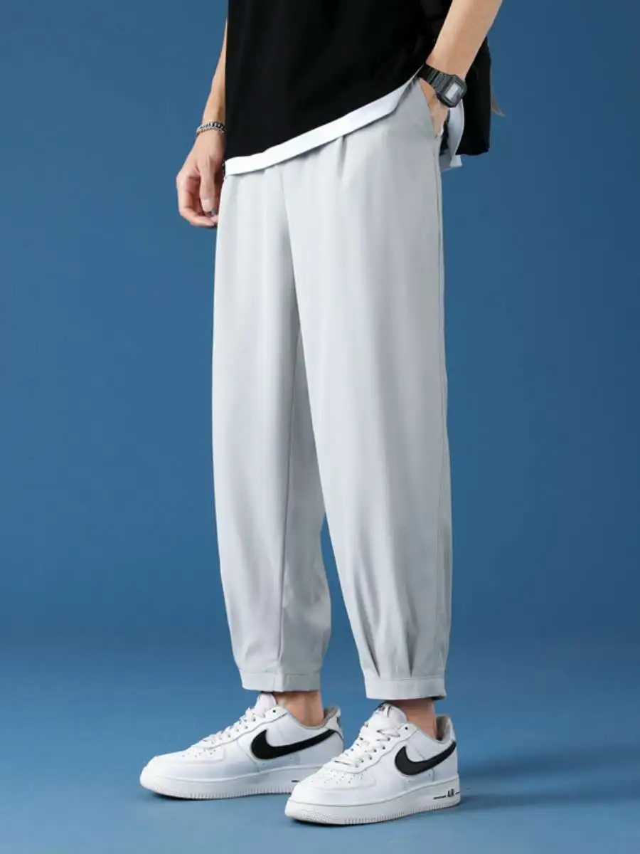 

Мужские повседневные брюки из ледяного шелка, зауженные, быстросохнущие, тонкие, для весны и осени, летние спортивные брюки-капри, широкие брюки для отдыха