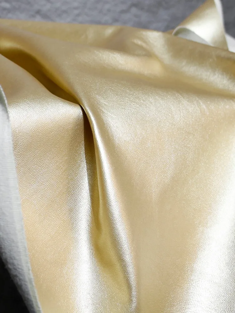 PU Leather Fabric Fine Grain Skin Champagne Gold Soft Leather Elastic Free Clothing Designer Fabric Cloth Apparel Sewing